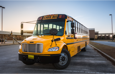 bus-solo-parked-outside-at-dusk