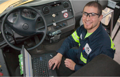 school-bus-driver-climbing-into-drivers-seat